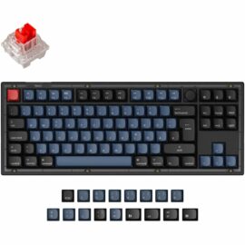 Das Bild zeigt die Keychron V3 Knob Mechanische Gaming-Tastatur in einer Draufsicht. Im oberen Bereich ist die gesamte Tastatur zu sehen mit blauen Tasten und schwarzer Umrandung, die rechts oben einen Drehknopf hat. Darüber hinaus ist links oben eine einzelne rote Schaltertaste zu erkennen, die offenbar das mechanische Schaltelement darstellt. Im unteren Bereich des Bildes sind zusätzliche Tastenkappen in verschiedenen Funktionen und Größen, darunter Tasten wie "esc", verschiedene Mediensteuerungssymbole und alternative Befehlstasten, abgebildet. Dieses Bild dient dazu, die Ausstattung und das Design der Keychron V3 Knob Mechanischen Gaming-Tastatur zu präsentieren.